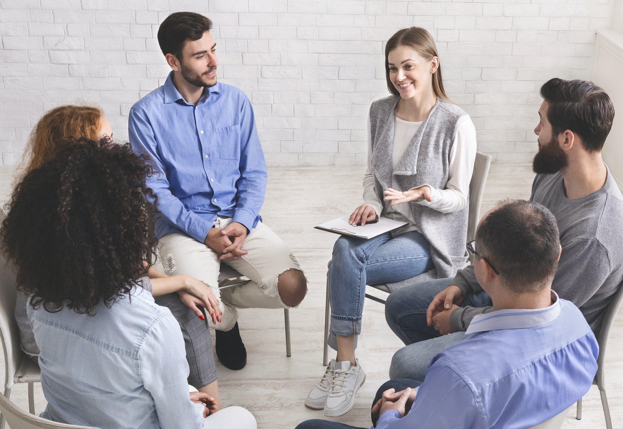 psychotherapist talking with patients