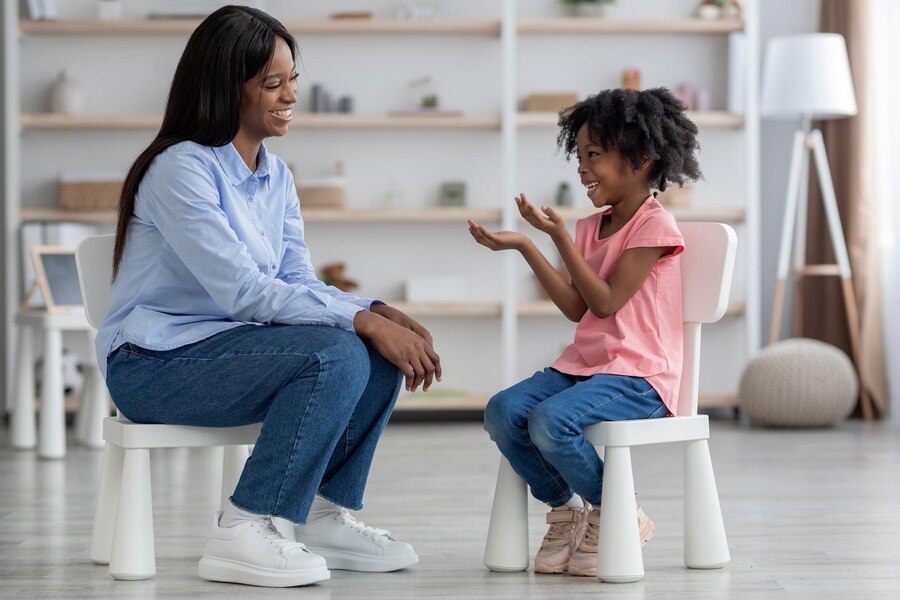 emotional cute little black girl child psychologists office